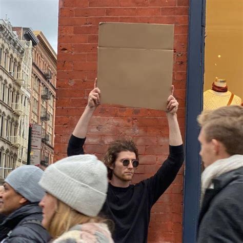 Man Holding Carboard meme template